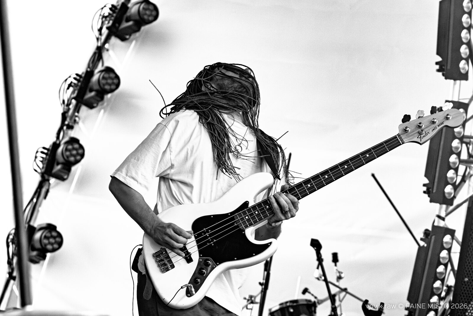 Stas Koroliov live — black-and-white, playing bass